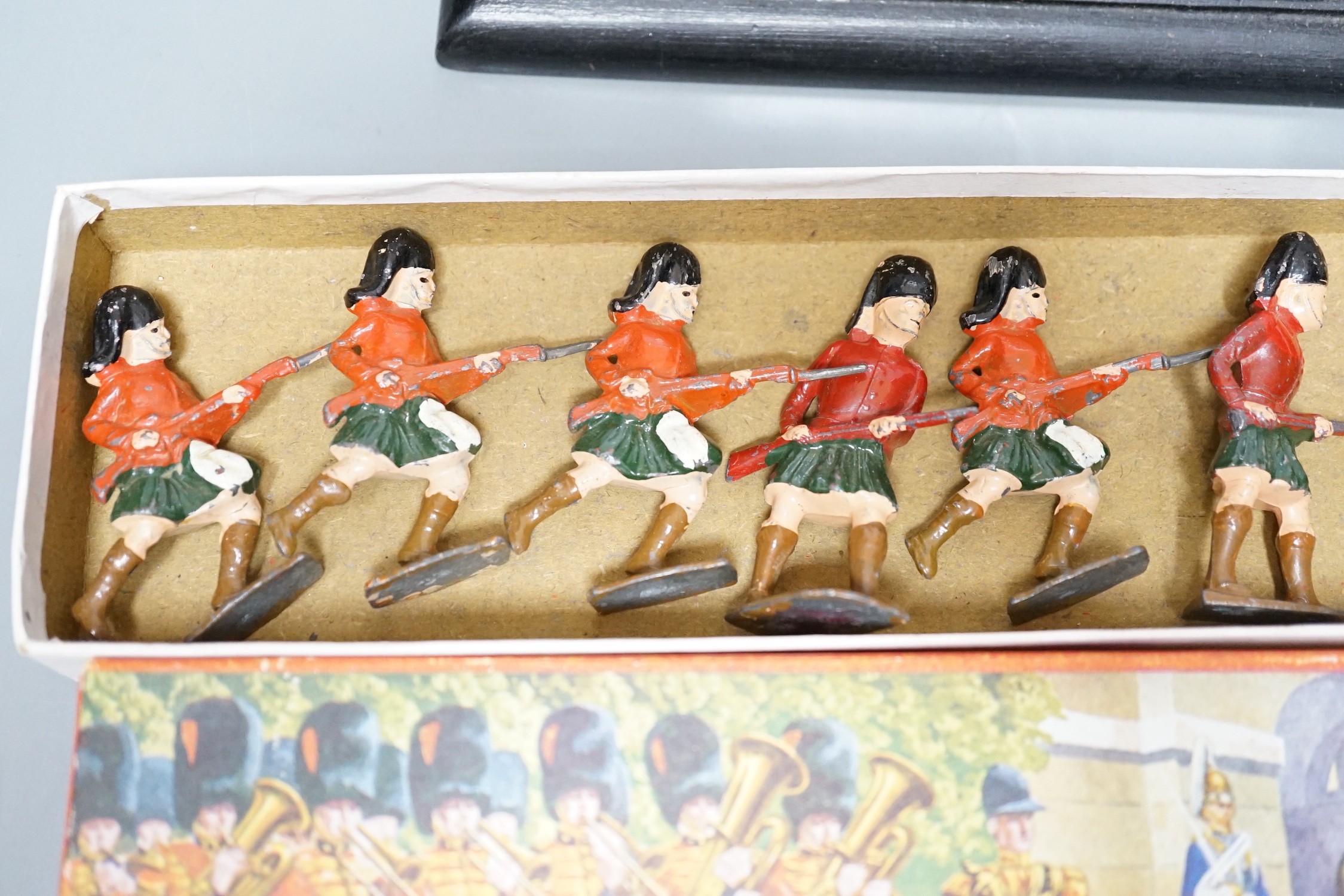 Presentation sculpture to Com. Jonathan Lett by The Army Air Defence Command together with a set of lead soldiers. Tallest 20cm